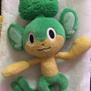Green and Yellow Plush Toy